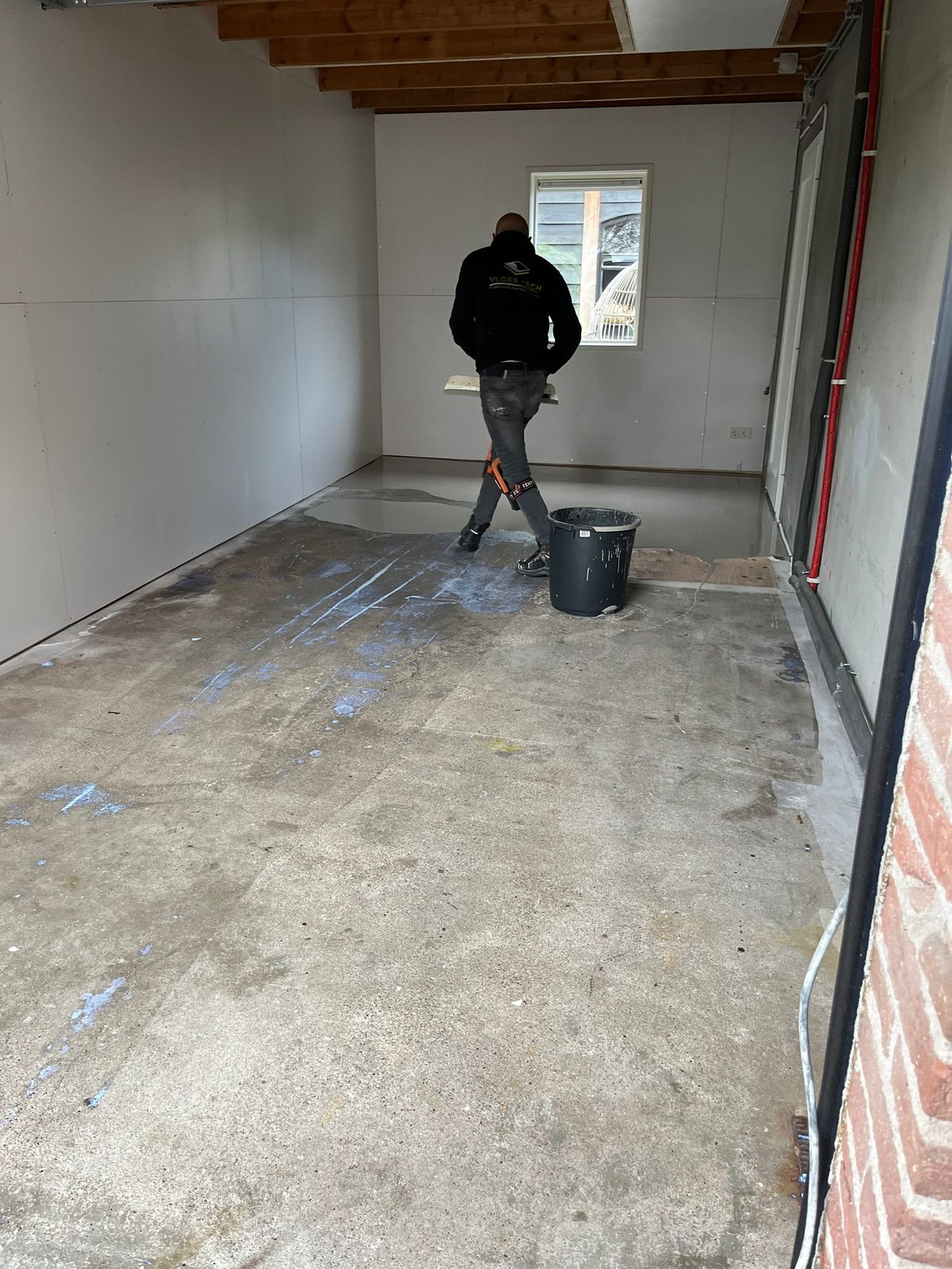 Vloer Tech egaliseert een garage
